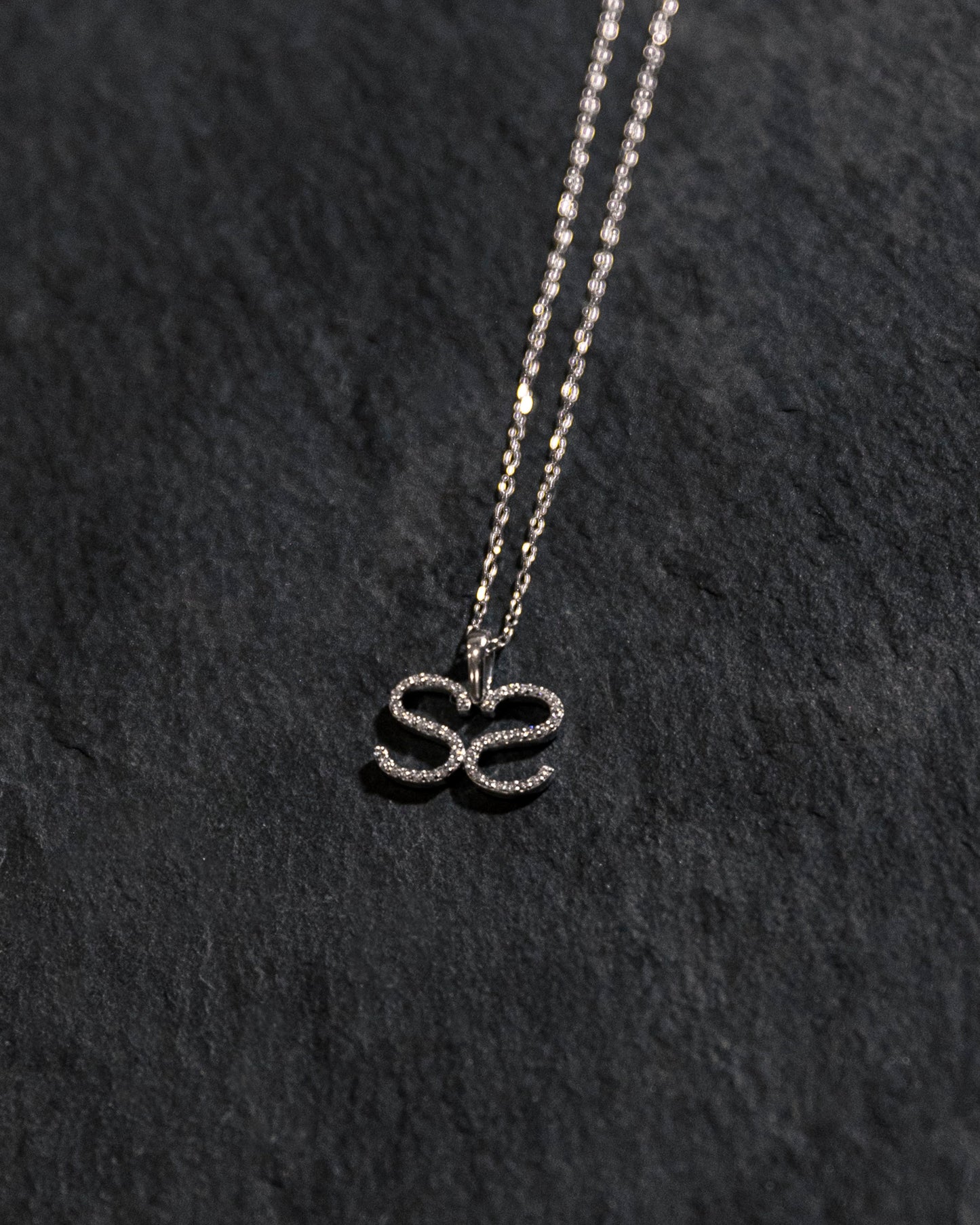 Lifestyle Image - Personalized 14k Gold and Diamond Cattle Brand Pendant