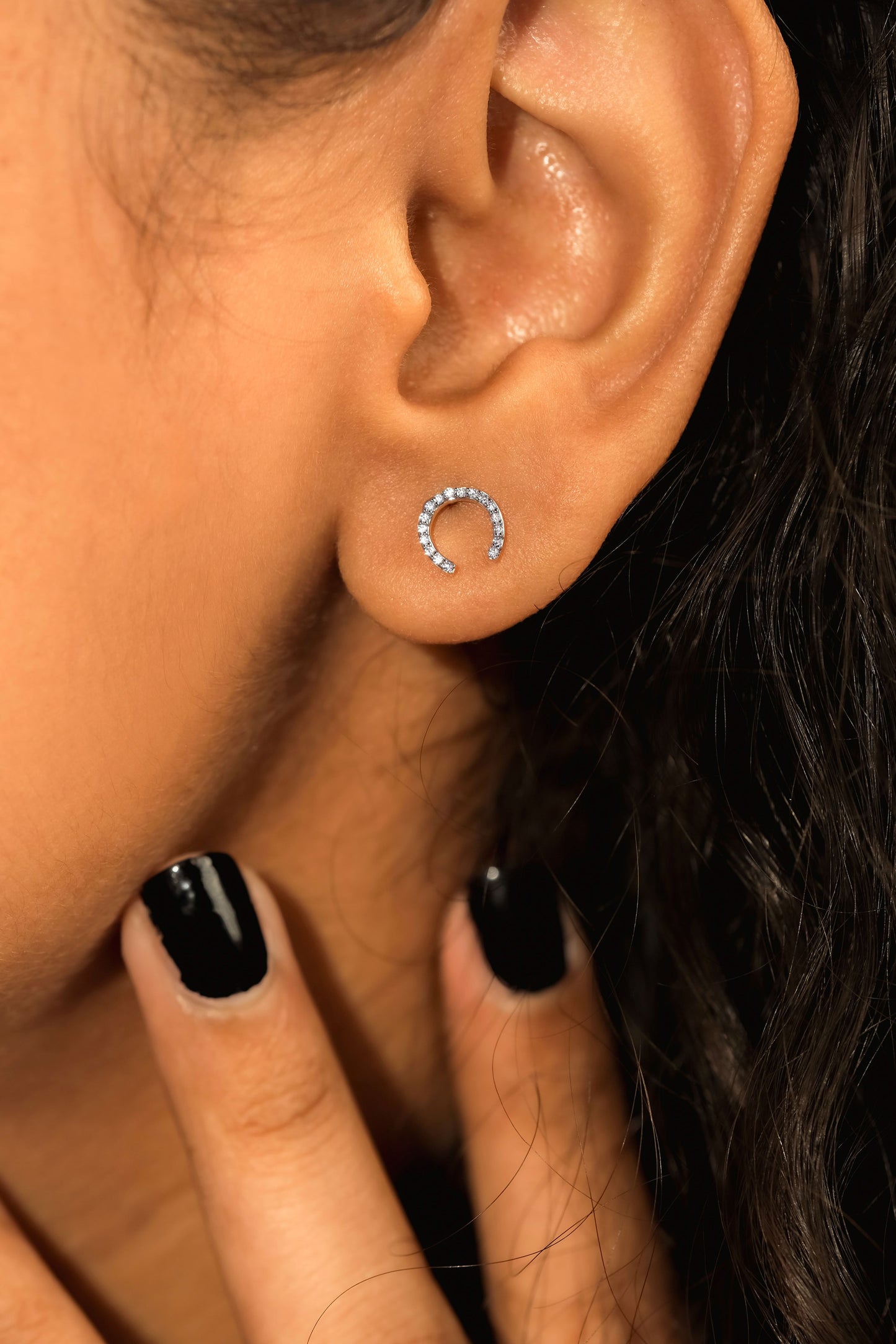 Lifestyle Model Image - Dainty Gold Diamond Horseshoe Stud Earrings