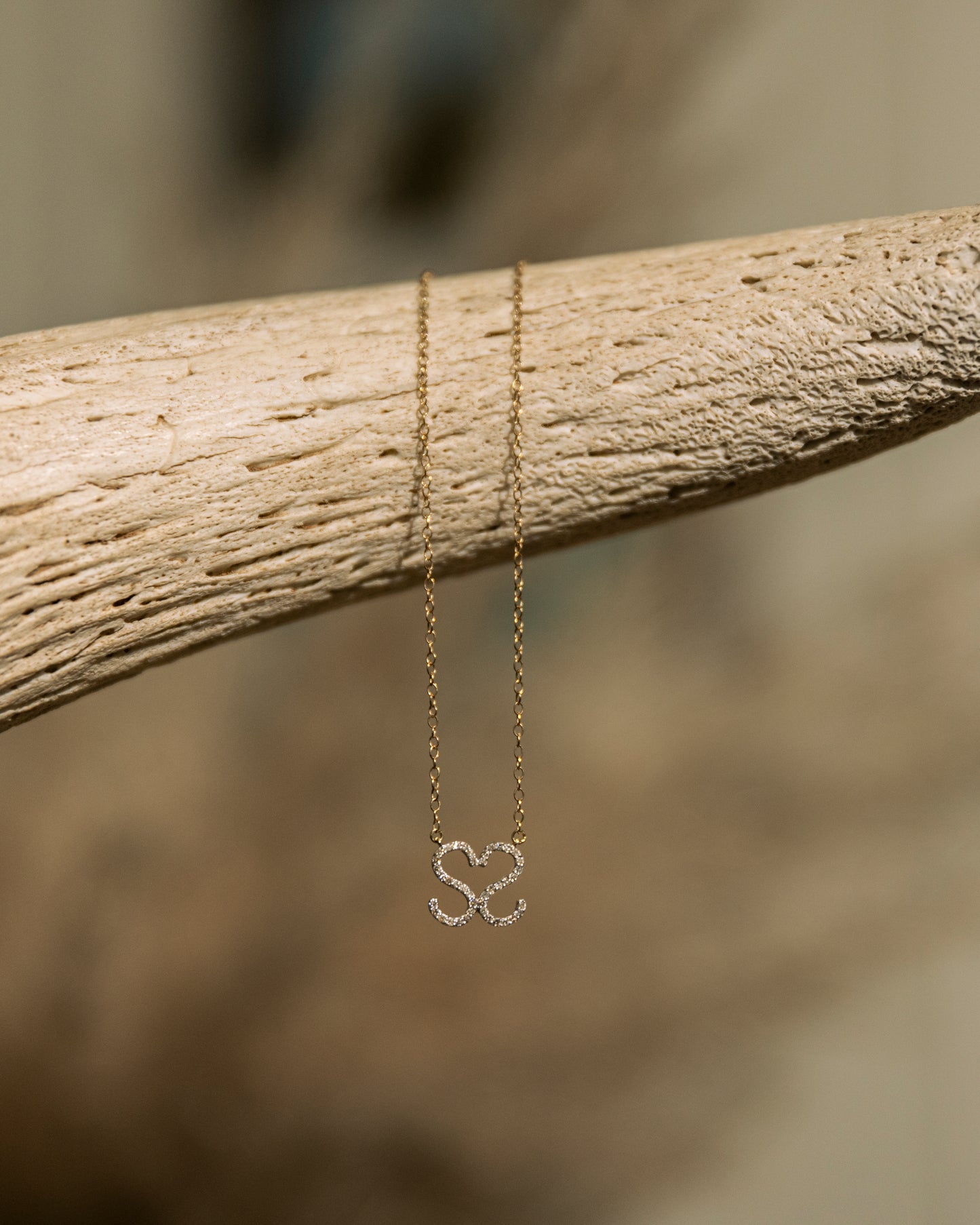 Lifestyle - Custom 14k Gold and Diamond Cattle Brand Necklace